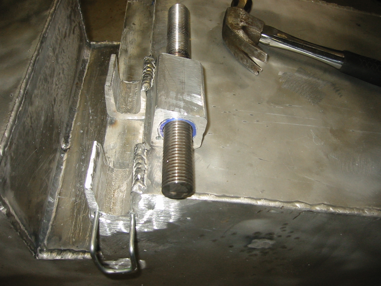 Cast it and drill holes so it can be pinned into place.