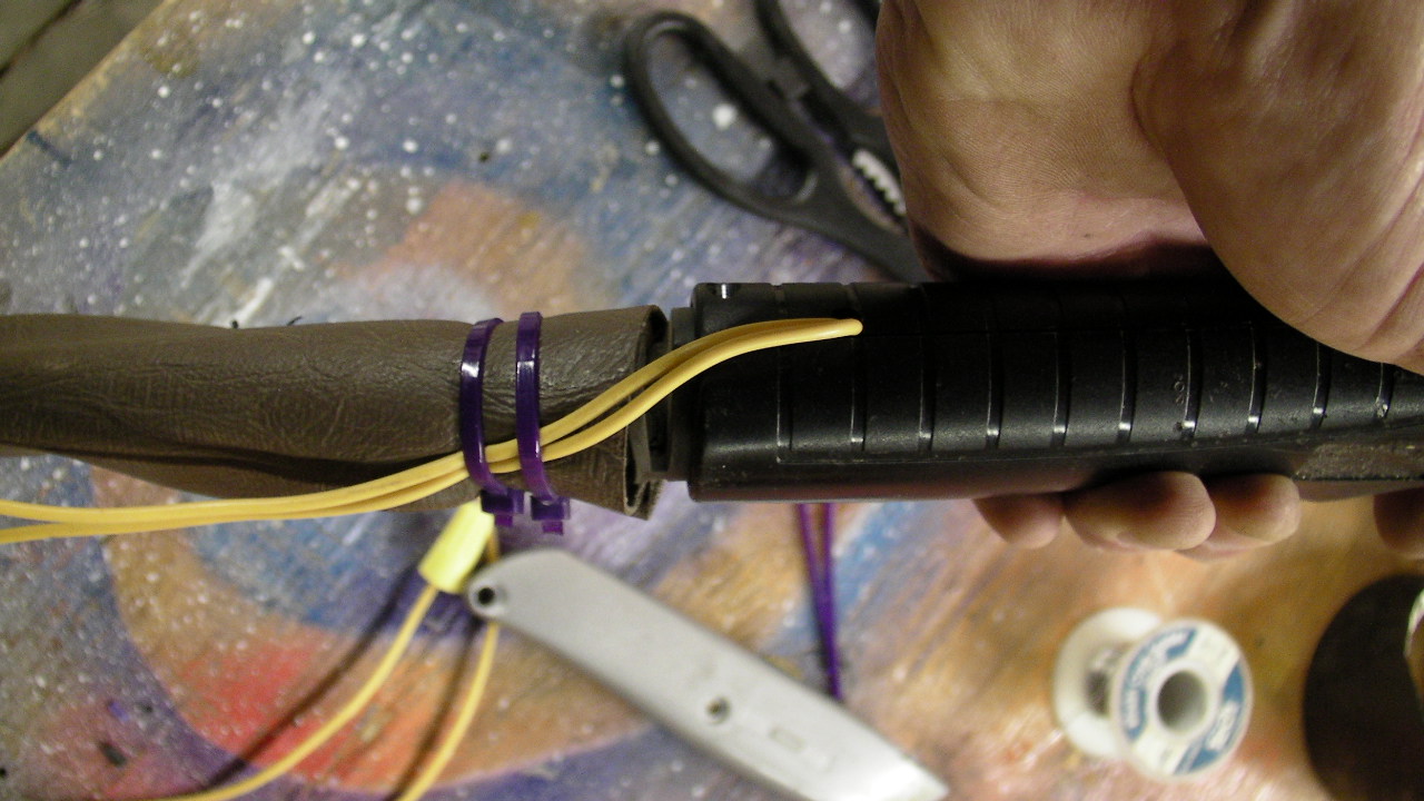 We strapped the wires down along with the cable cover.