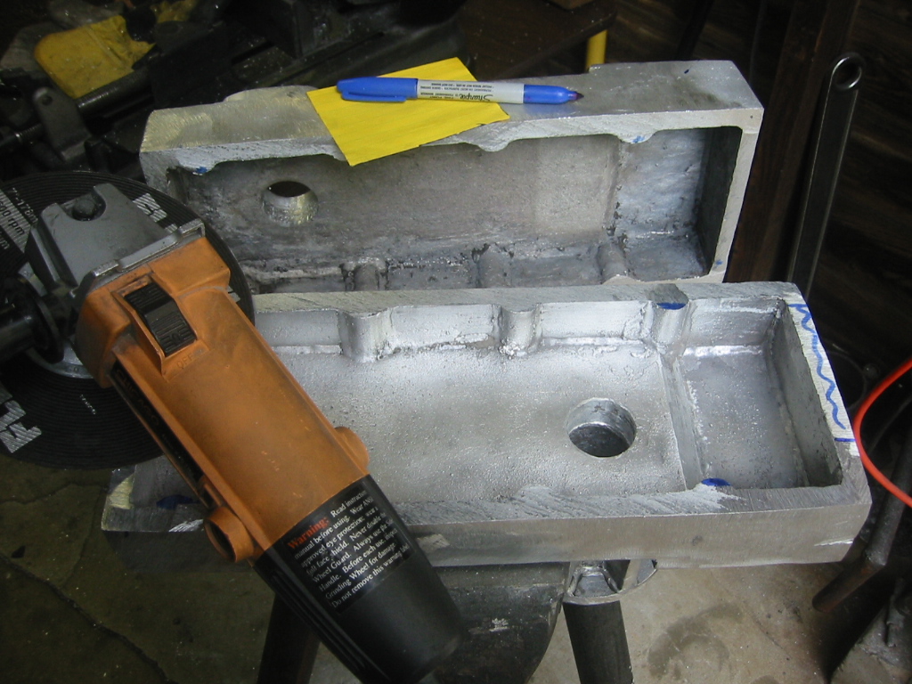 Gentling grinding down any high spot on the mating surfaces.