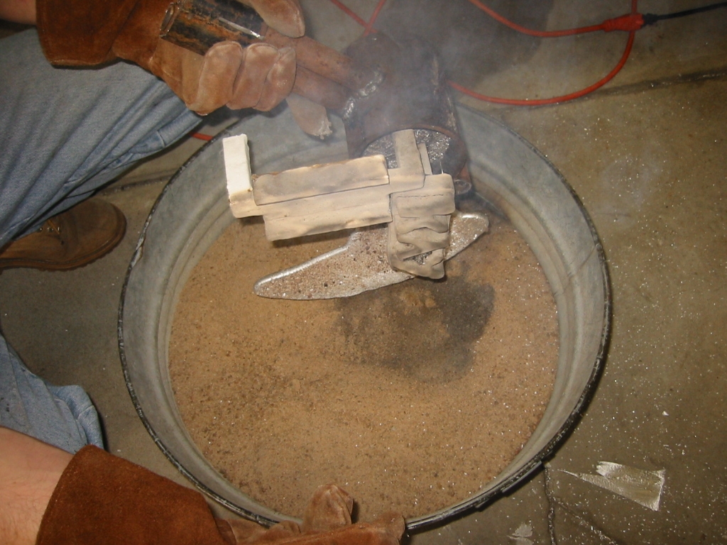 Pulling the part out.