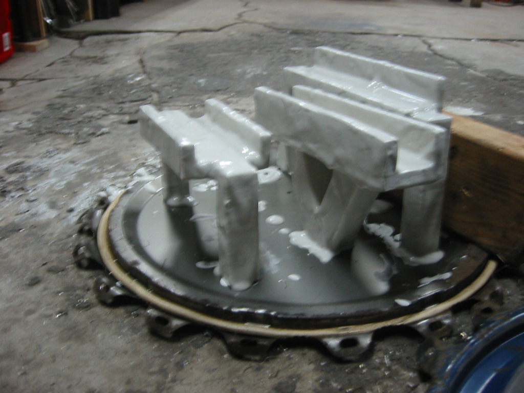 Foam parts drying after being coated with sheetrock mud.