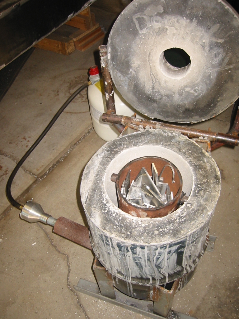 Crucible charged with scrap.