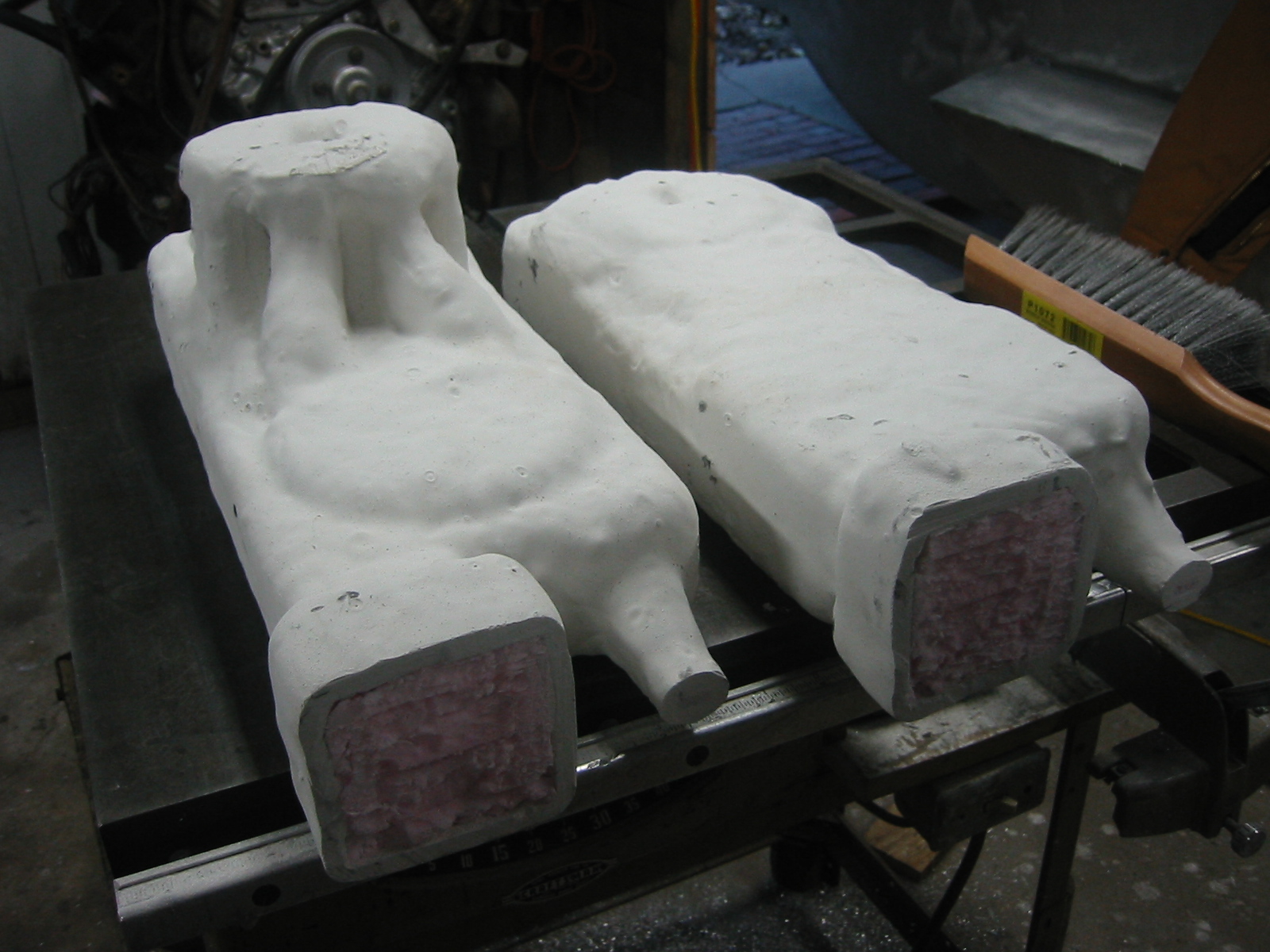 Parts are dipped in sheetrock mud investment, dried and then dipped again, until a thick layer of investment is built up.