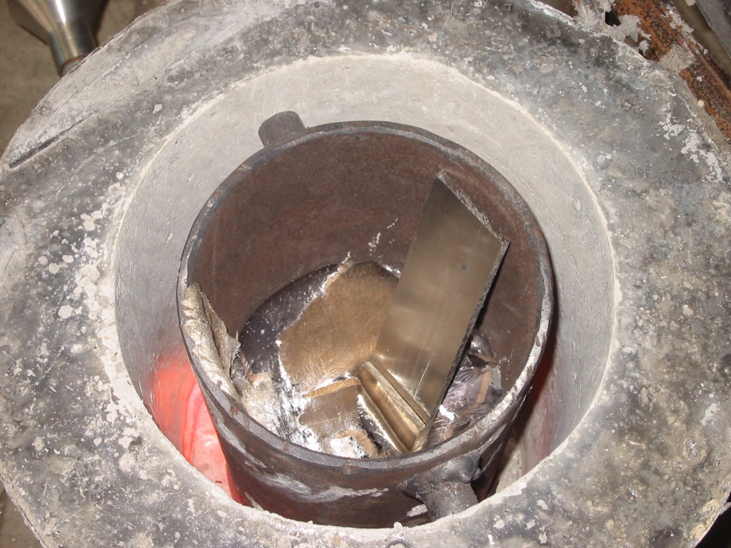 Additional pieces of scrap aluminum can safely be added as long as they are dry.