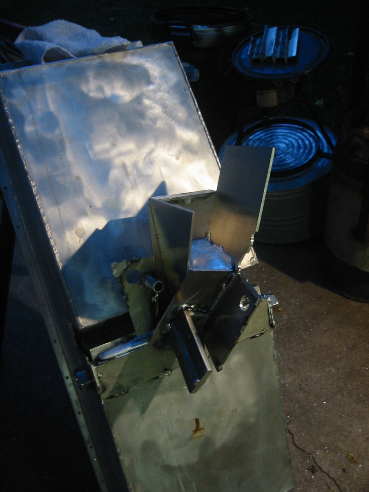 (4) Additional scrap was added as a heat sync for the funnel.