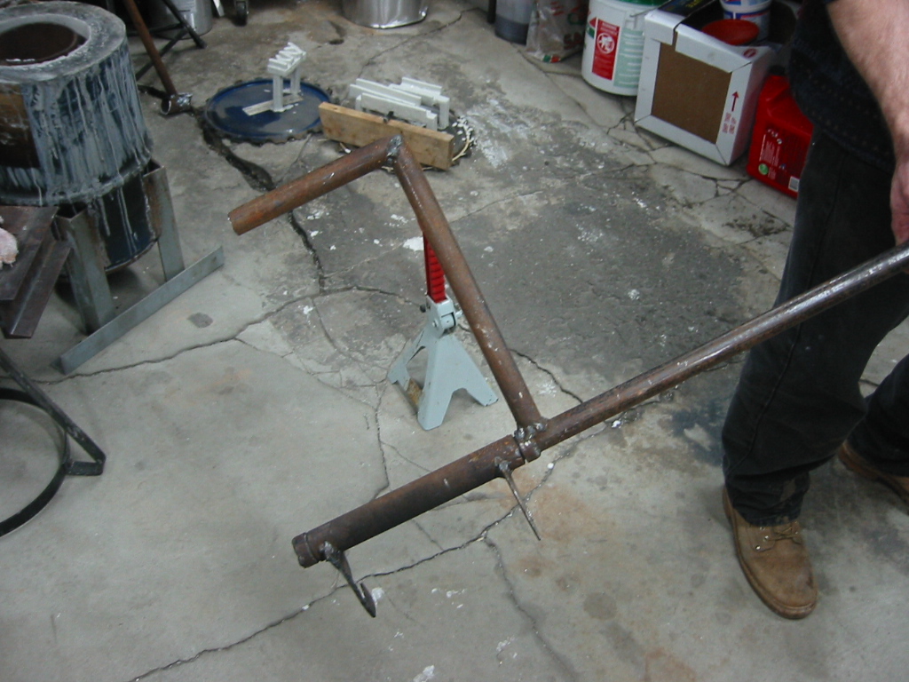 (13) Tool used to lift the crucible out of the foundry.