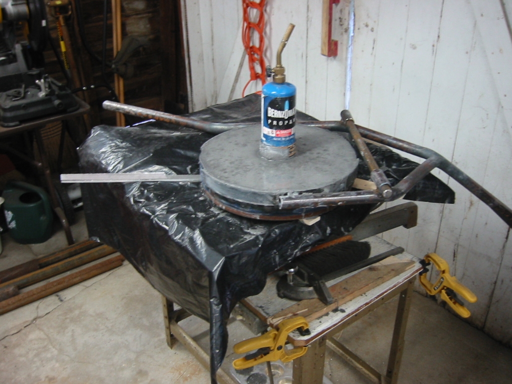 (3) Mizzou Castable Refractory poured in and vibrated by the table saw underneath. 