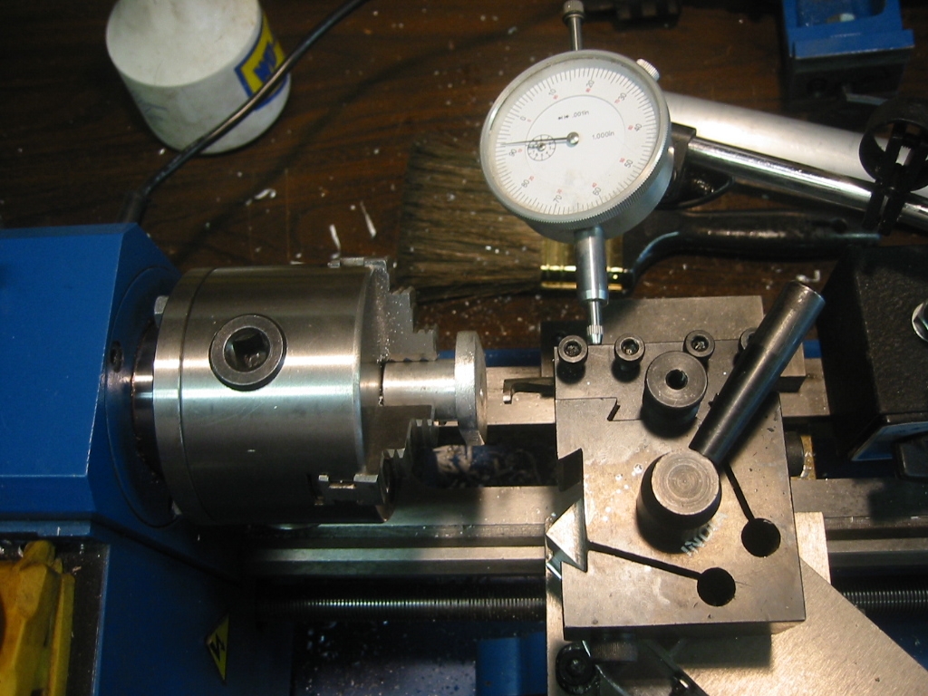 (4) Dial caliper setup to measure the depth of the groove.
