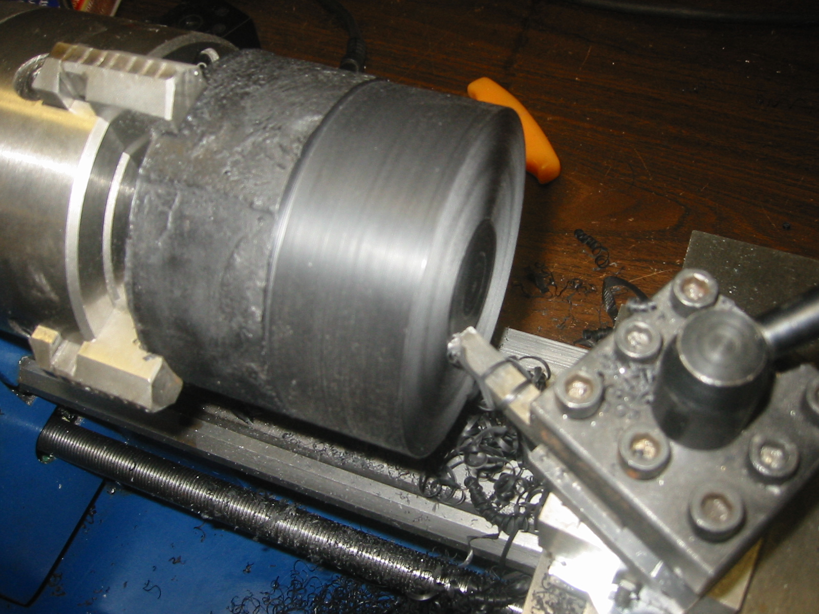 (5) Machineable wax in the lathe.  